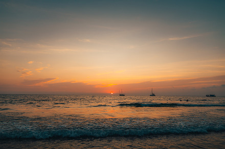 Orange beach at summer dusk on the island, a Nature Photo by Art Rachen