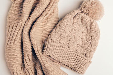 Knitted scarf and a beige cap, a Beauty & Fashion Photo by Mellisandra