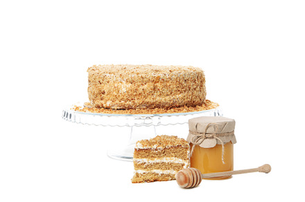 Concept of sweets, honey cake, isolated on white background, a Food & Drink Photo by AtlasStudio PRO