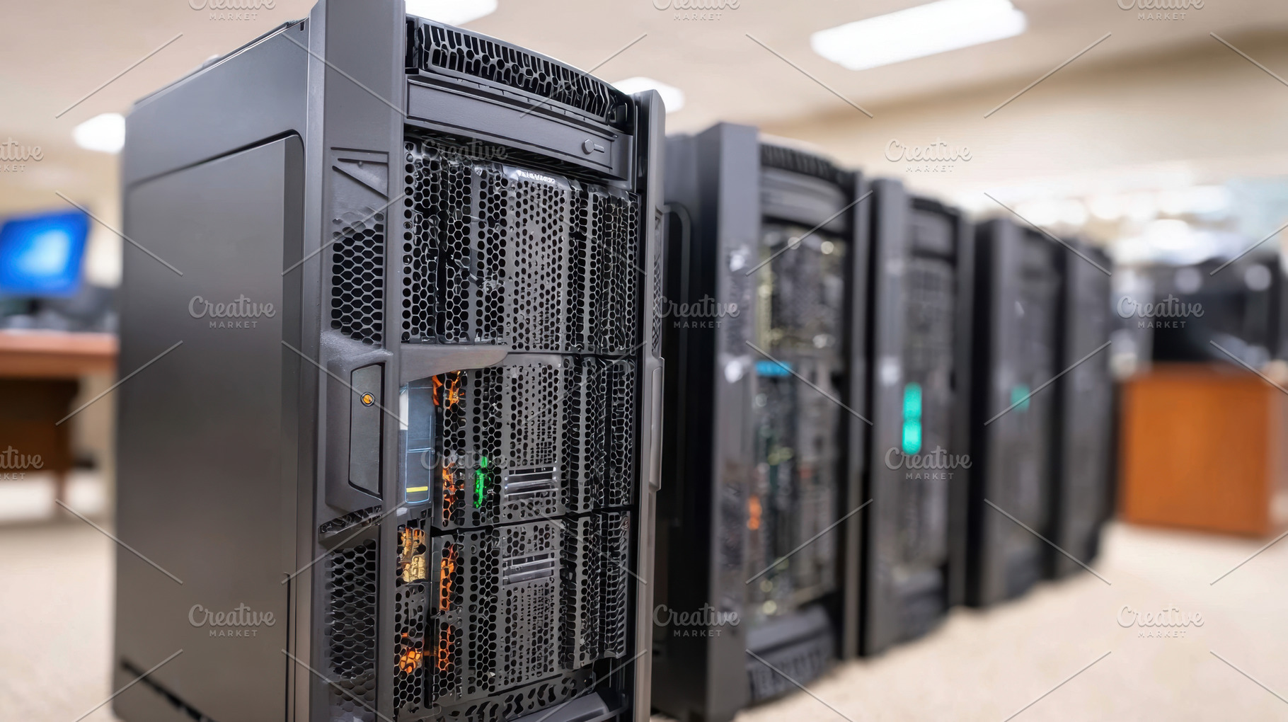 Row of black computer servers in a data center, a Technology Photo by AlyaAnd