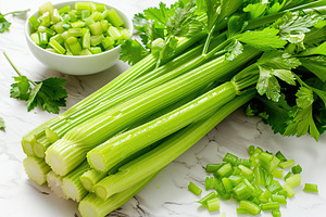 Green fresh celery sticks on white background, a Food & Drink Photo by AlyaAnd