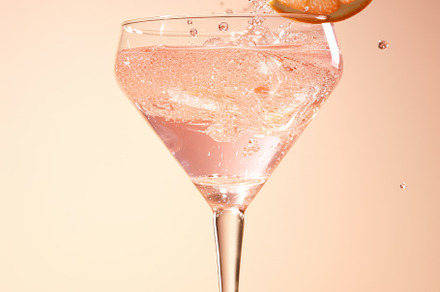 Alcohol cocktail drink in cocktail glass on pink background, a Food & Drink Photo by Natalia Klenova's Shop