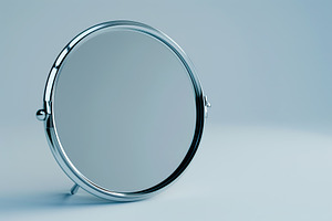 Round mirror for makeup on white background, an Abstract Photo by AlyaAnd