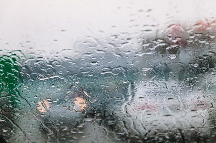 Traffic stands still, on a cold, wet day, shot through a windscr, a Nature Photo by TanaCh
