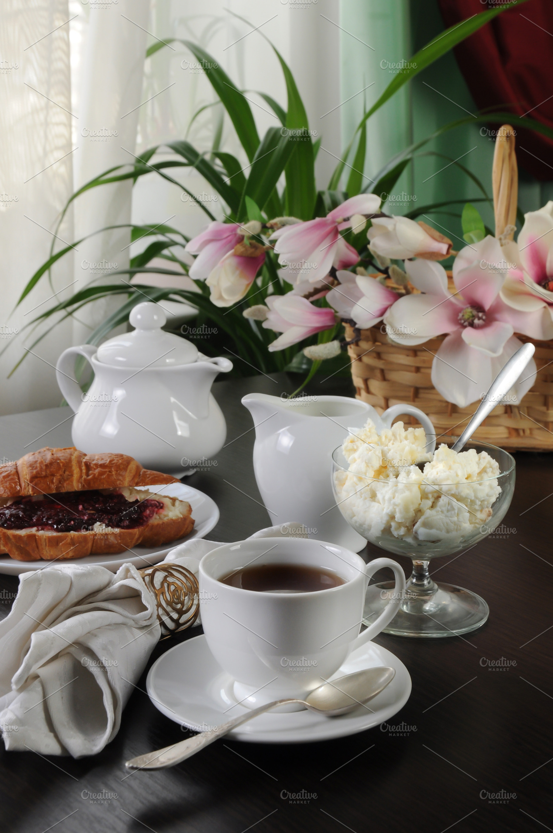 Breakfast tea with croissant,, a Food & Drink Photo by Apolonia
