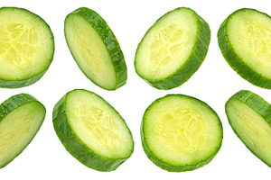 Fresh cucumber slices isolated