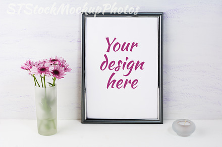 Frame mockup with lilac daisies, a Photo by TasiPas