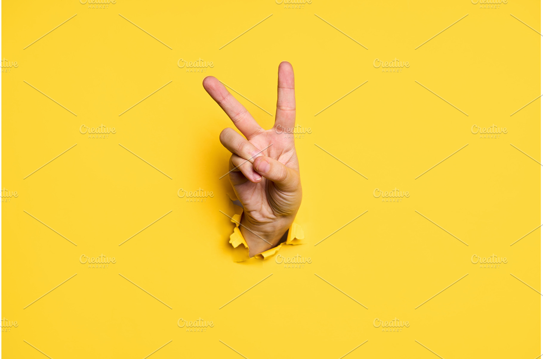 V sign for victory or peace gesture, a Background Photo by Gladkov photography