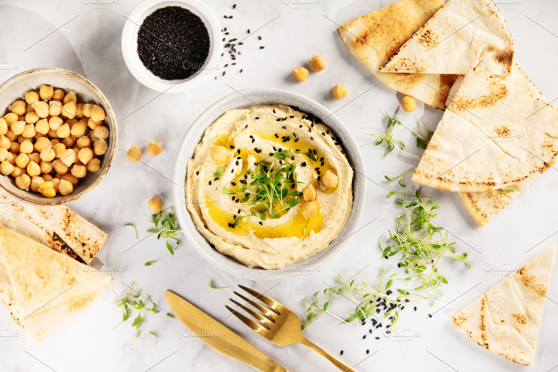 Creamy Hummus with Pita Bread and Black Sesame Seeds, a Food & Drink Photo by Natalia Klenova's Shop
