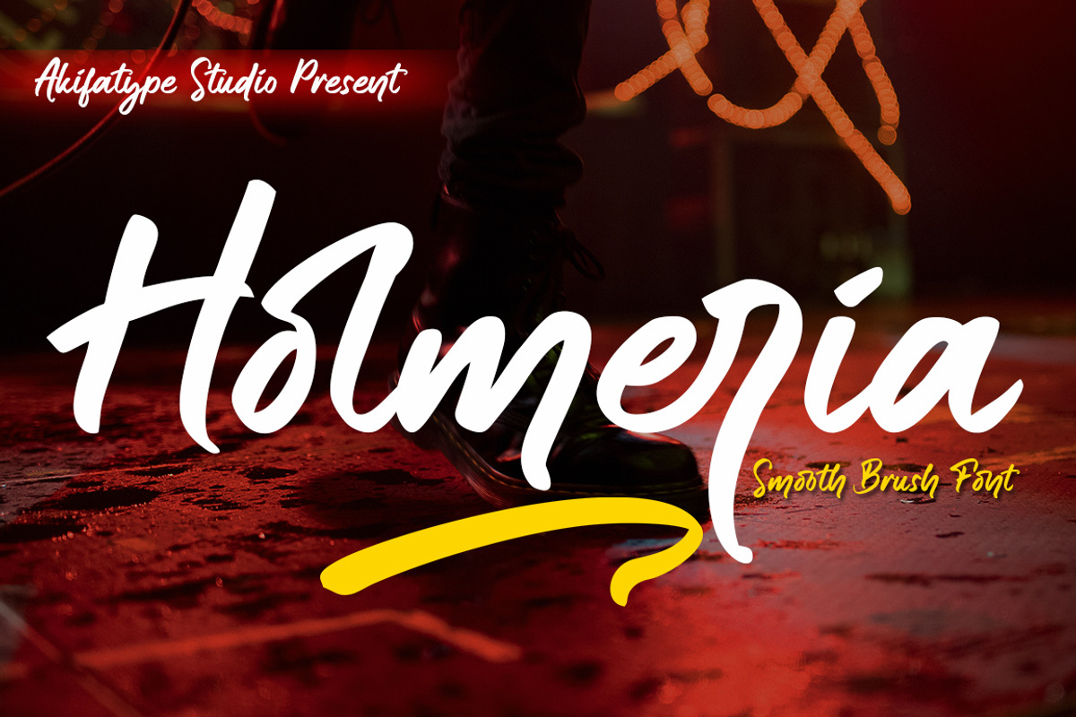Holmeria, a Script Font by Akifatype. (Photo 1 of 7)