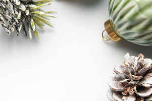 Christmas holiday decorations with pine cones and ornaments, a Holiday Photo by Olena Rudo