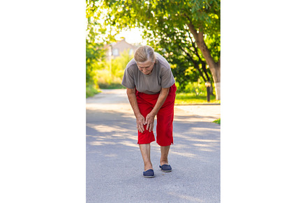 grandmother hurts her knee on the, a Health & Medical Photo by yanadjana