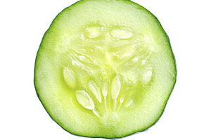 Cucumber vegetable slice isolated, a Food & Drink Photo by BOOCYS