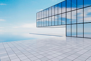 Modern glass building over water with minimal architecture, an Architecture Photo by RF Images