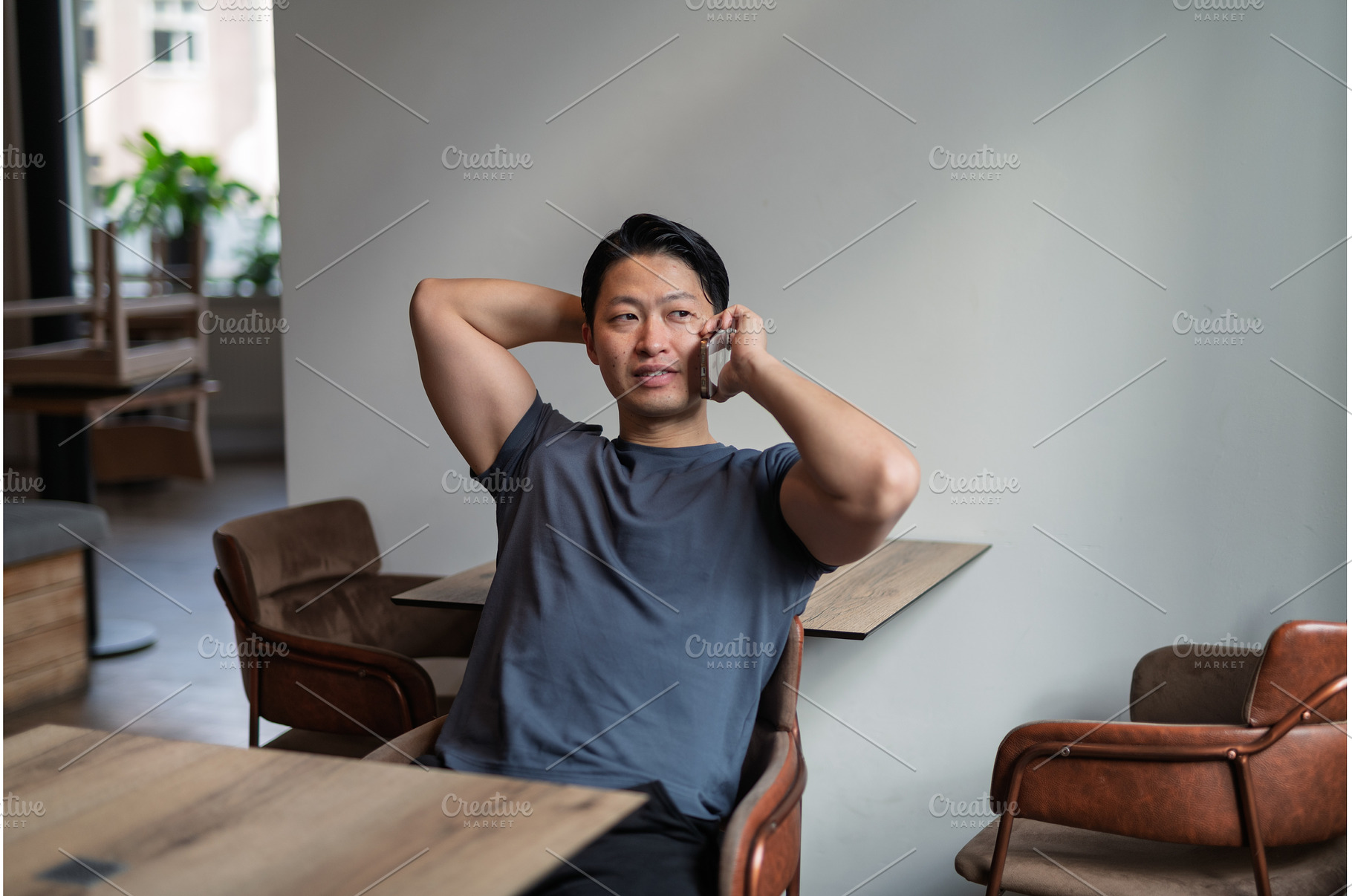 Confident man having phone call at, a Person Photo by HalfPoint