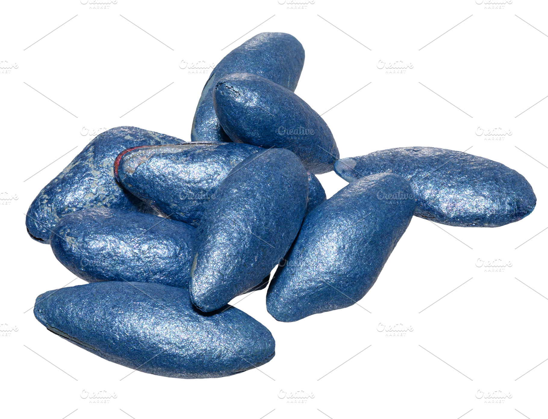 A close-up of a handful of cucumber seeds coated with a blue pro, a Food & Drink Photo by ndanko