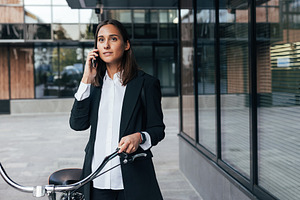 Young stylish woman in black attire, a Person Photo by Artem Varnitsin