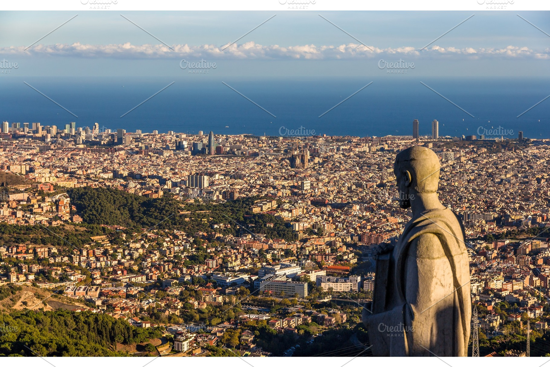 Sculpture of apostle and view of barcelona stock photo containing barcelona, an Architecture Photo by Leonid Andronov