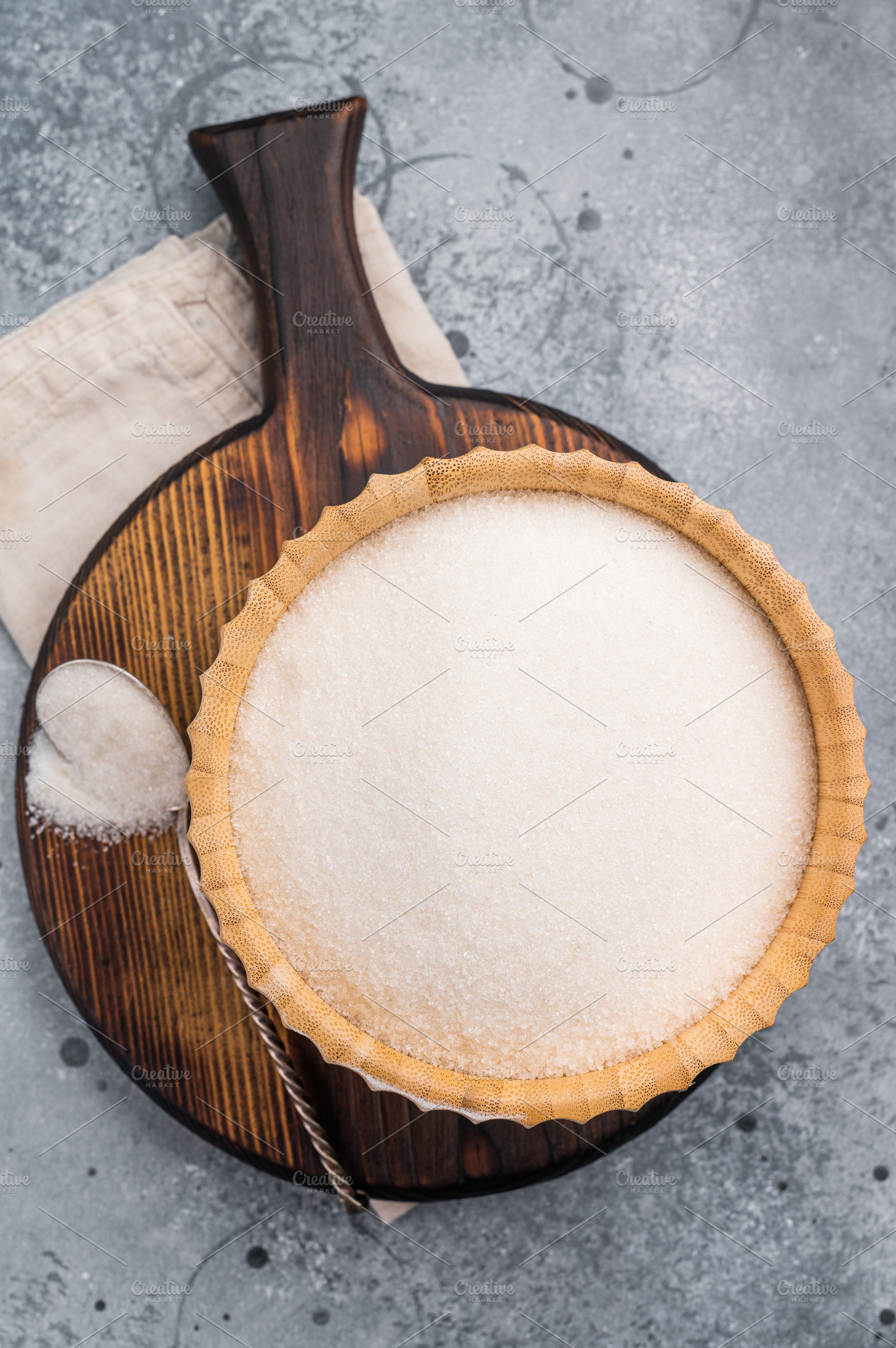 Versatile white sugar in a rustic bowl, ready to enhance dessert, a Food & Drink Photo by composter-box@mail.ru
