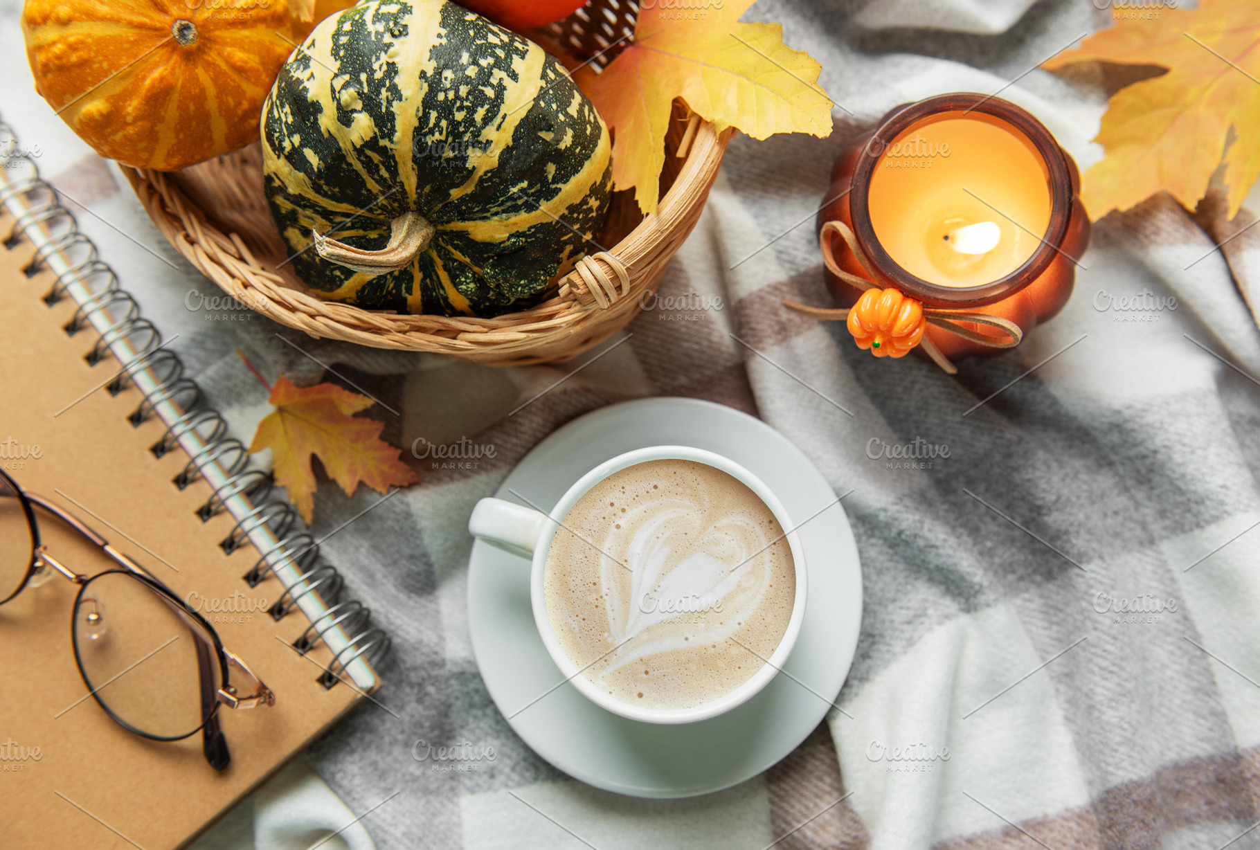 Autumn cozy moment with coffee, candle, and pumpkins, a Food & Drink Photo by Olena Rudo