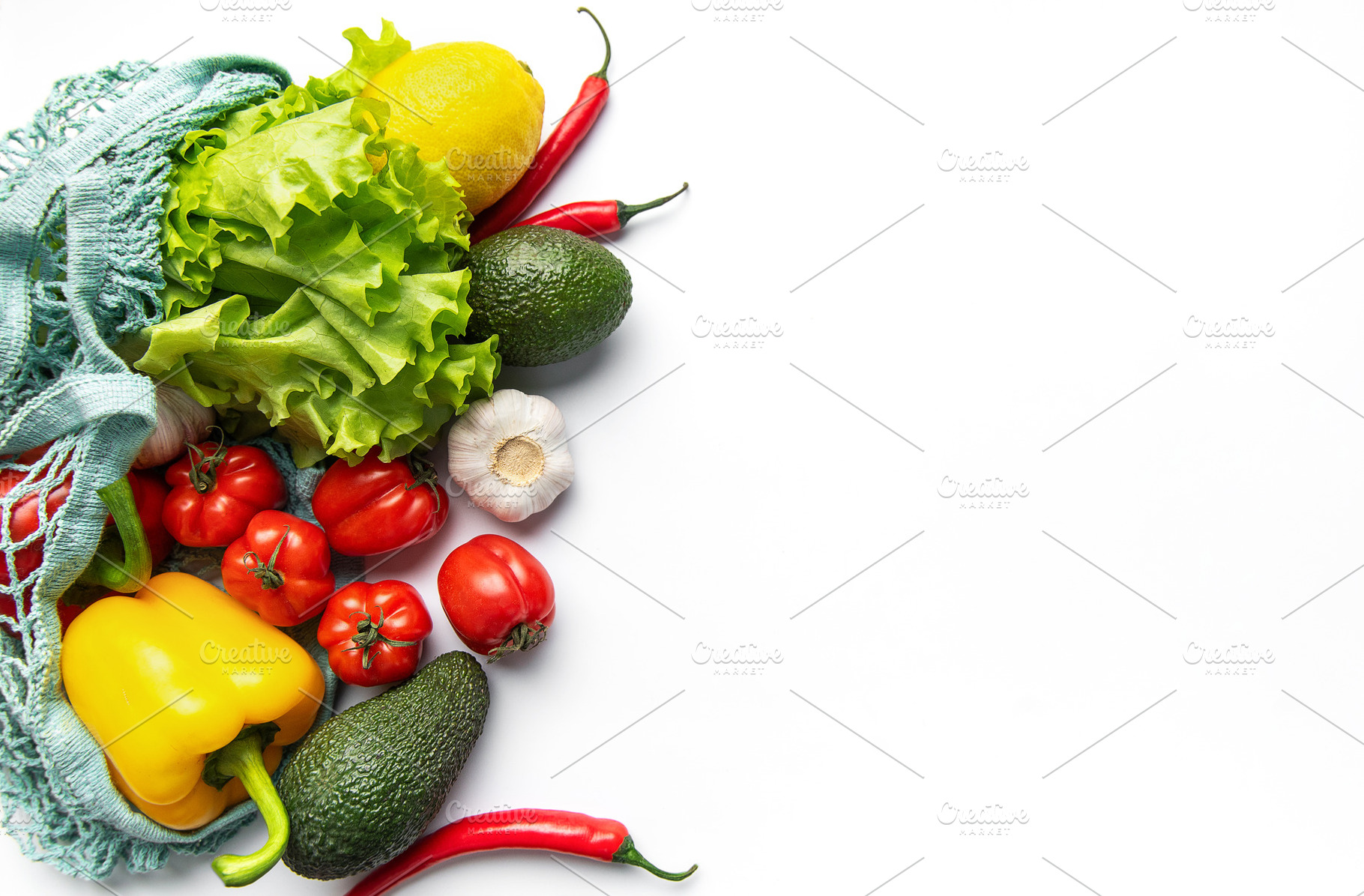 Fresh produce in string bag for healthy eating, a Food & Drink Photo by Olena Rudo