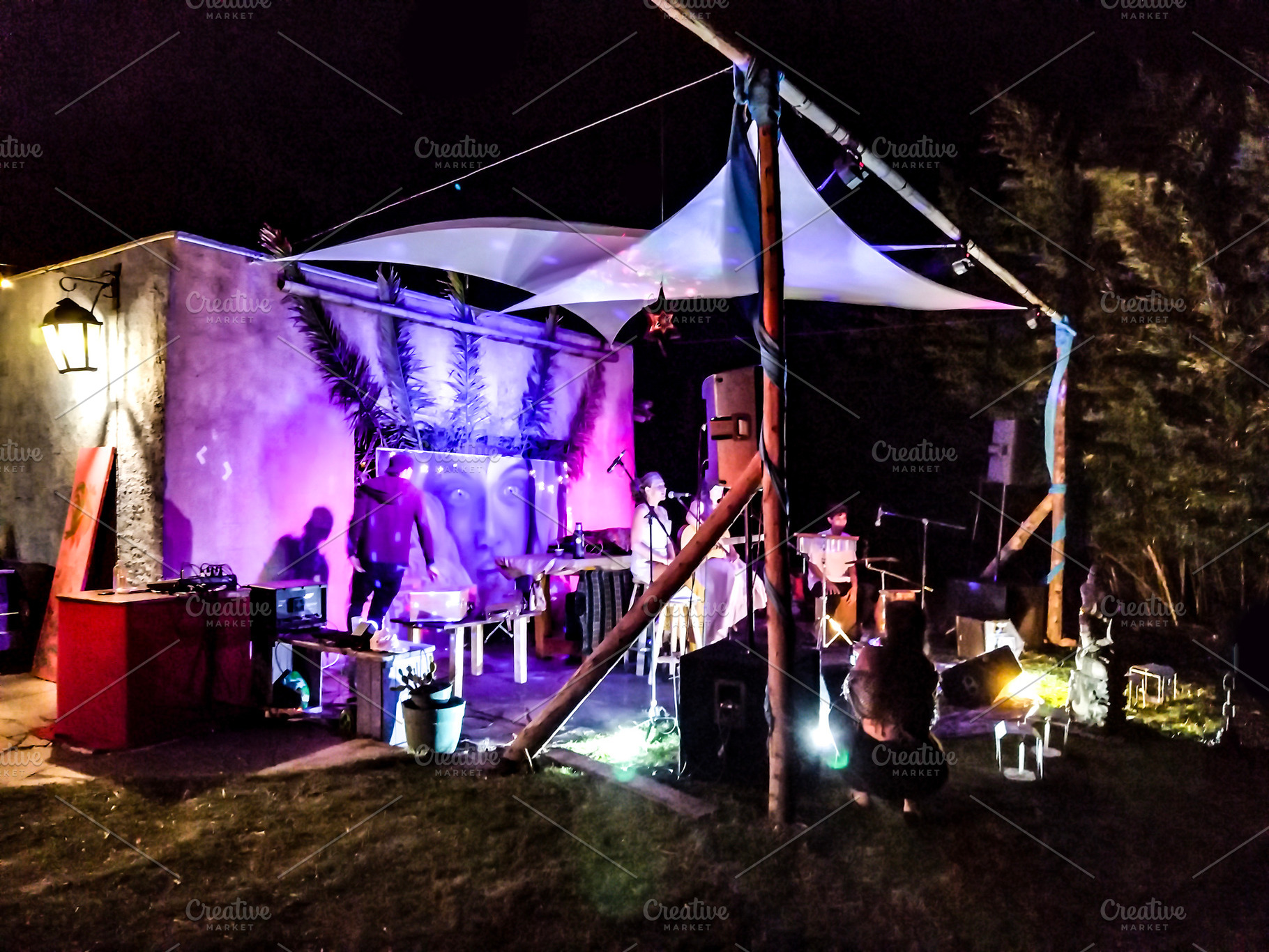 Outdoor bohemian night concert, a Person Photo by DanFLCreativo