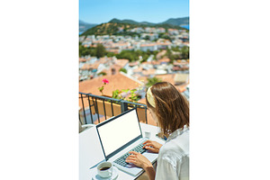 Rear view freelancer woman working
