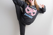 Little girl doing gymnastics on color background :: Stock Photography  Agency :: Pixel-Shot Studio