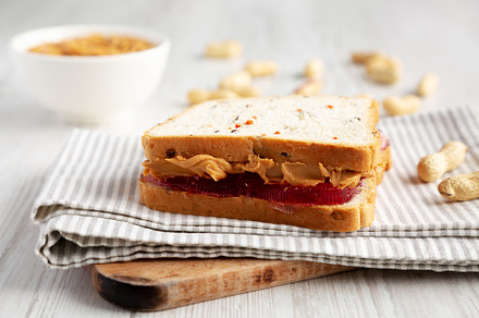 Homemade Peanut Butter and Jelly Sandwich, side view., a Food & Drink Photo by LiudmylaChuhunova