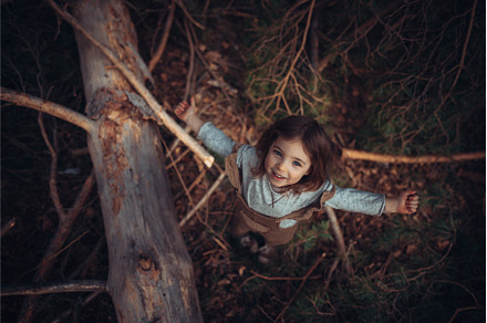 High angle view of happy little girl, a Person Photo by HalfPoint