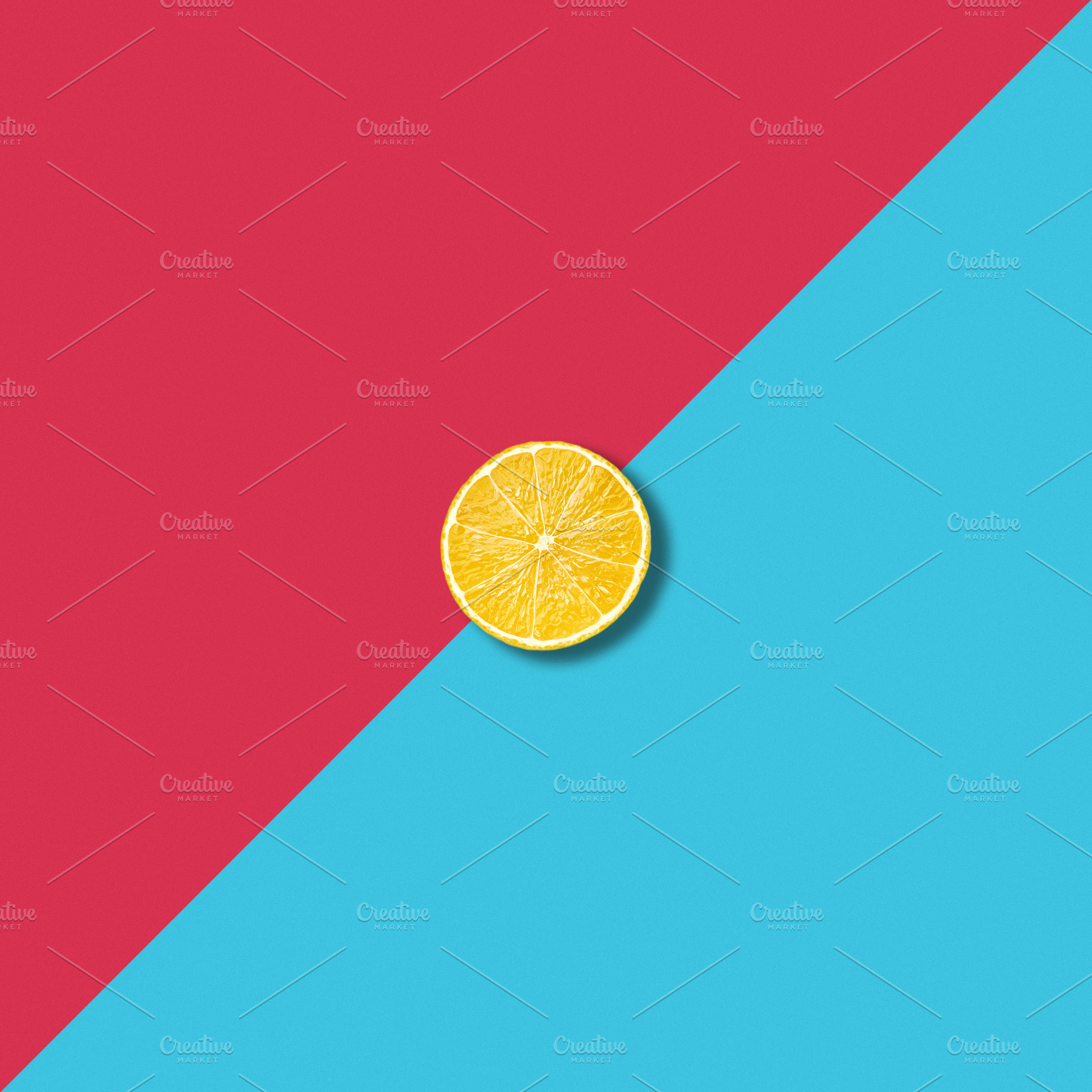 Lemon slice on colorful background, an Abstract Photo by BOOCYS