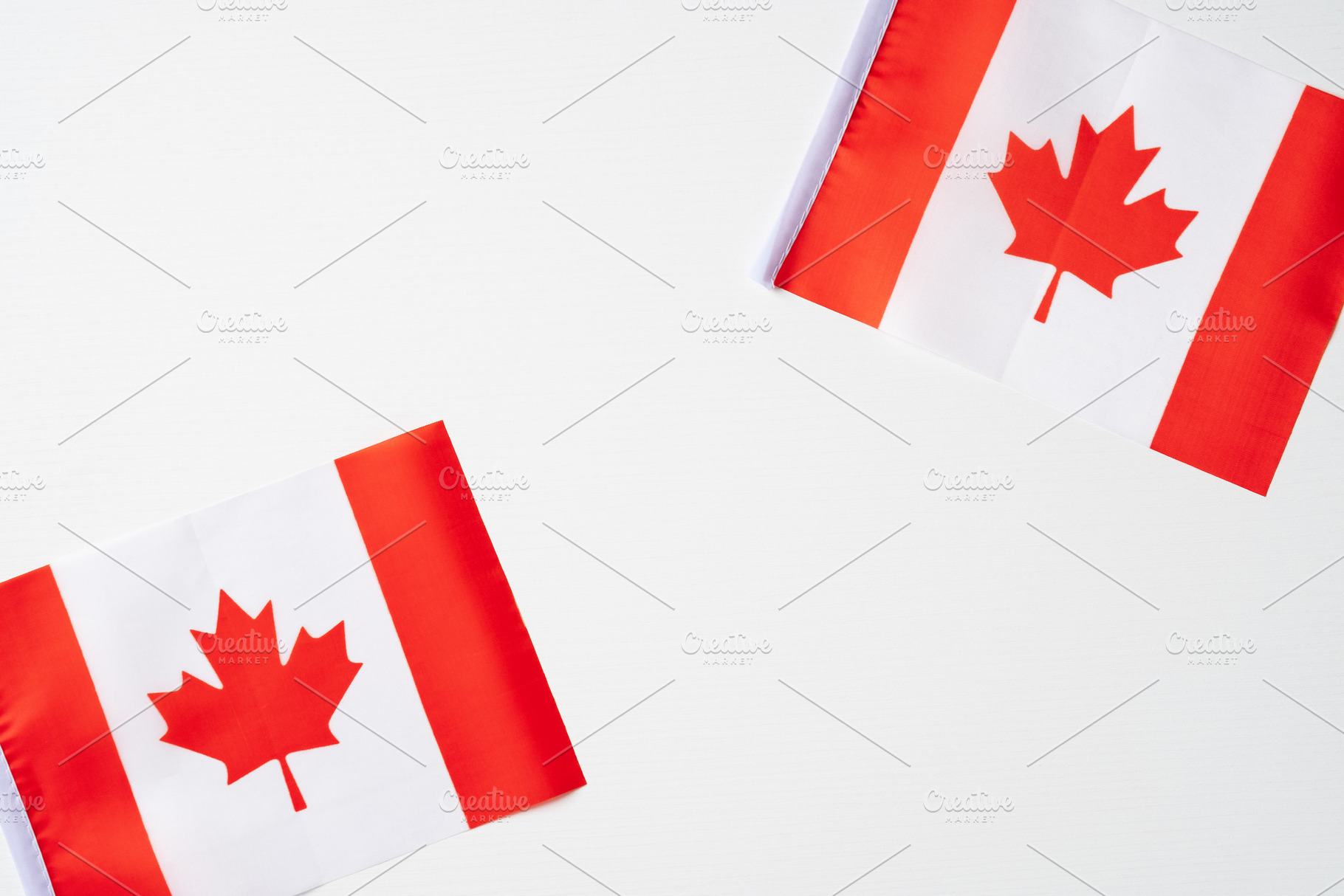 Canadian flags on white background, a Holiday Photo by photoguns