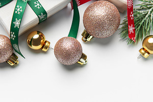 Christmas presents with festive ribbon and ornaments, a Holiday Photo by Olena Rudo