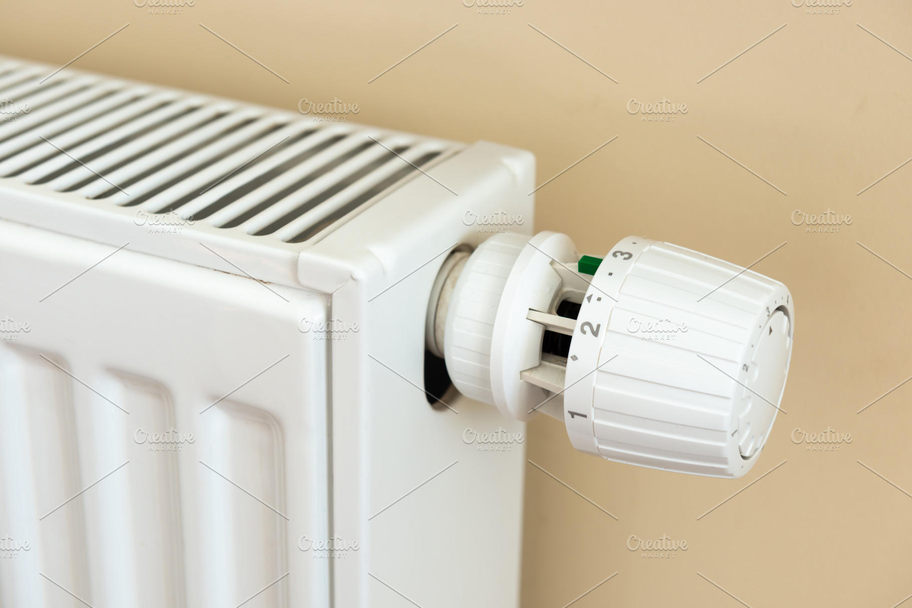Thermostat head control regulator on home radiator, an Industrial Photo by Vapi