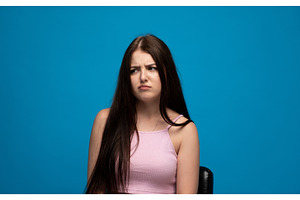 Young woman expressing doubt and, a Person Photo by volodymyrshtun13795