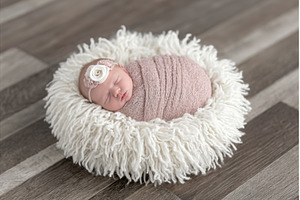 A newborn baby girl is gently placed, a Person Photo by ZinetroN