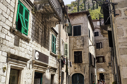 Beautiful narrow street with lantern, an Architecture Photo by Photo by YuraYaryna