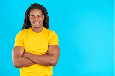 Happy latin man with dreadlocks, a Person Photo by Iván Moreno STOCK PHOTO
