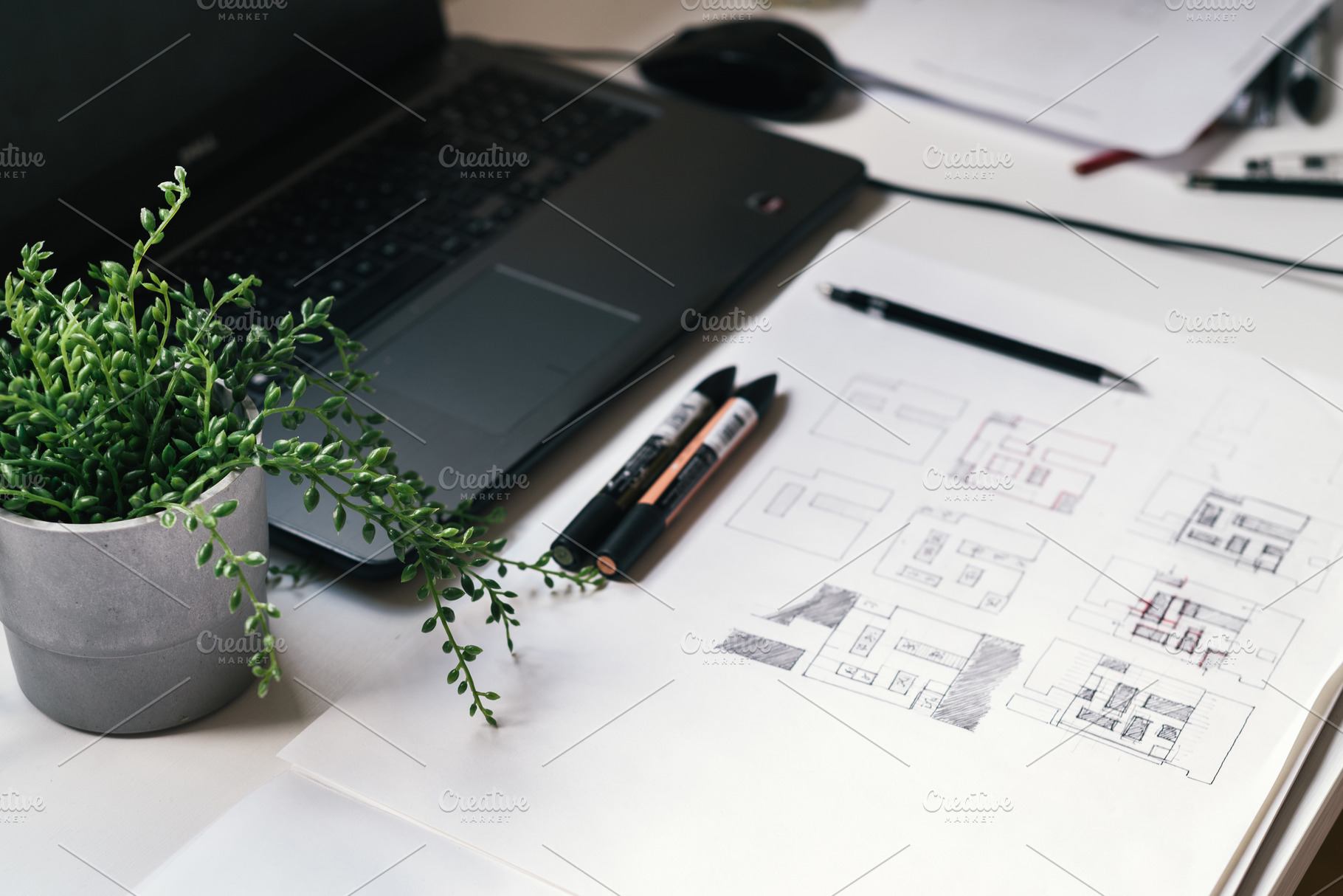 Architect desk with sketches featuring hand-drawn, markers, and sketches, an Architecture Photo by Architect´s eye