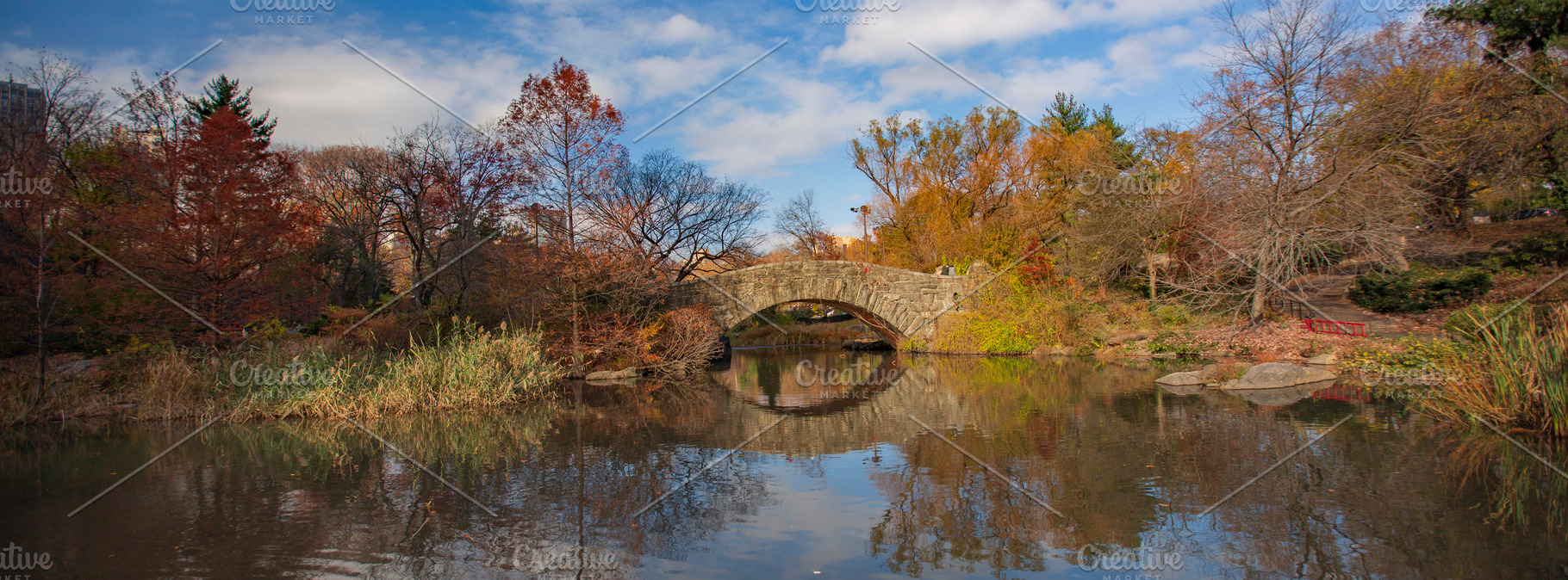 Stone arch bridge in autumn Central Park with reflection in pond, a Photo by Pictures for you!!!!!!!!!