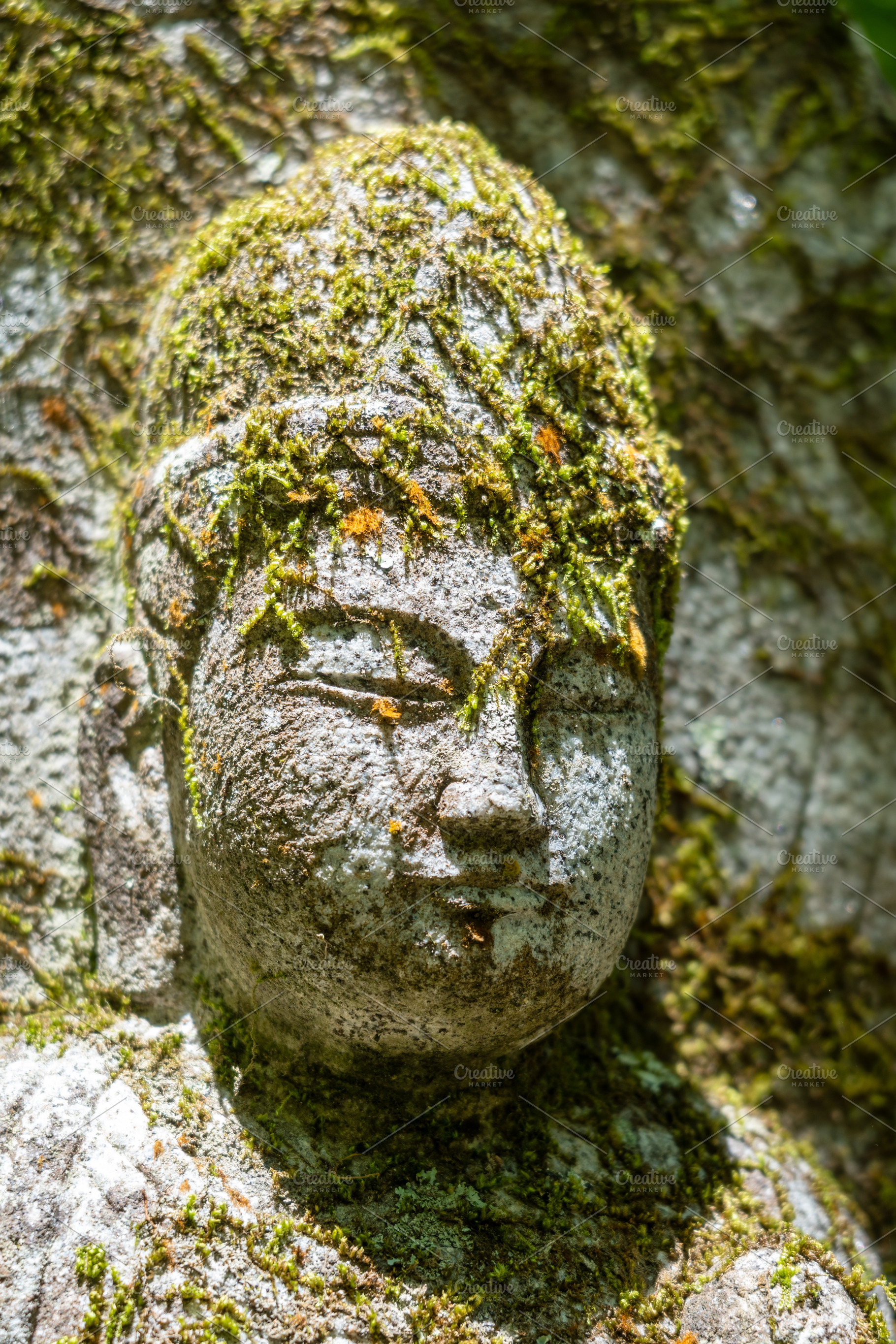 Kannon stone statue at Mitaki-Dera temple in Hiroshima, Japan, an Architecture Photo by GoodGoods
