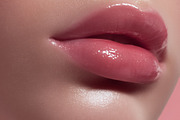 Woman's glossy pink lips and glowing skin close up, showcasing b, a Beauty & Fashion Photo by Studio ANNA (Thumbnail 1 of 2)