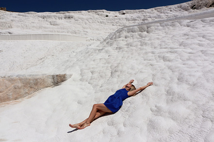 Relaxing woman on white landscape, a Holiday Photo by Irina