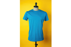 A blue t-shirt on a mannequin on a, an Illustration by tilialucida