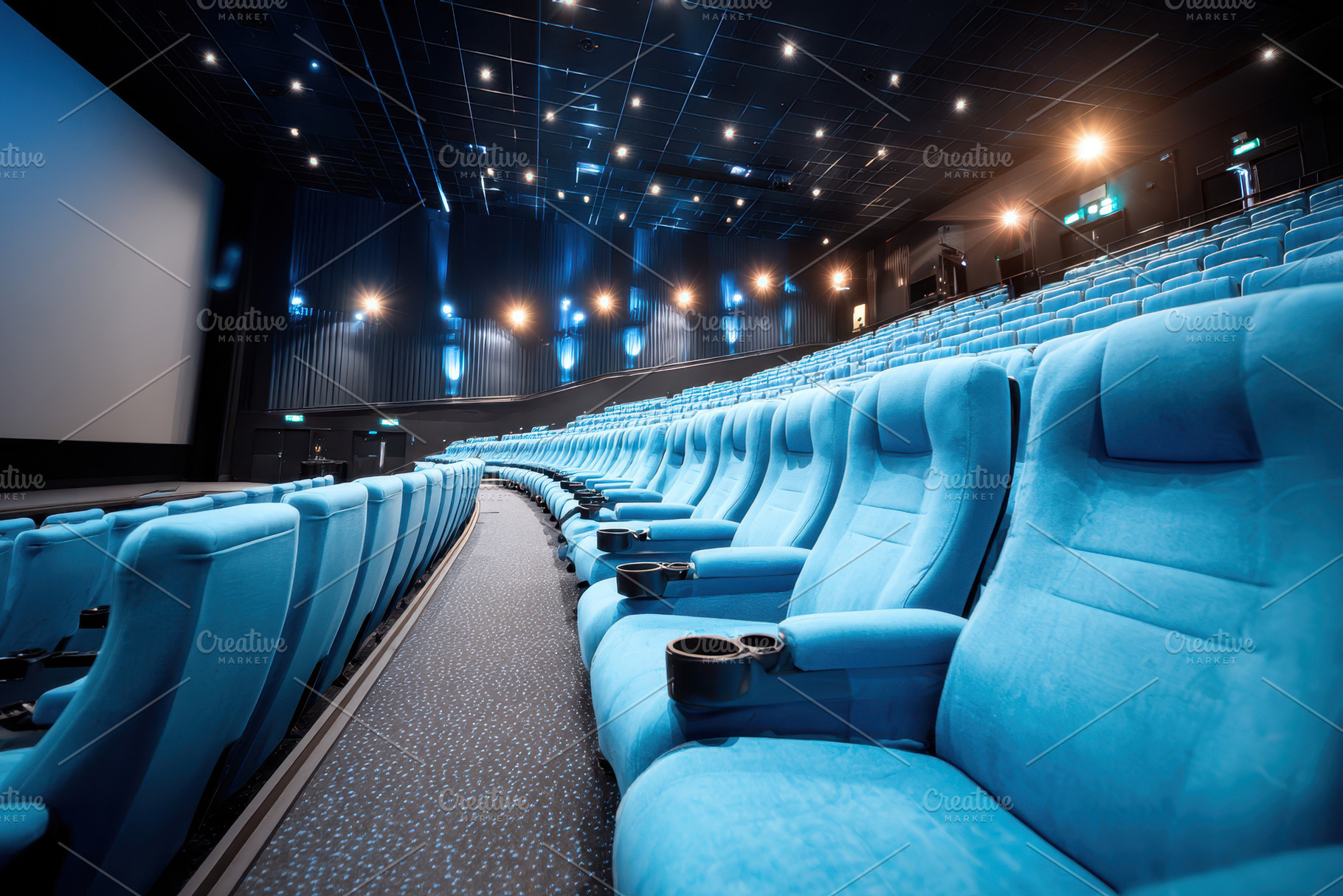 Modern cinema theater with blue leather seats, an Arts & Entertainment Photo by AlyaAnd