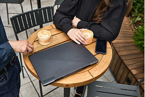 Casual cafe meeting with laptop, a Business Photo by wip3out