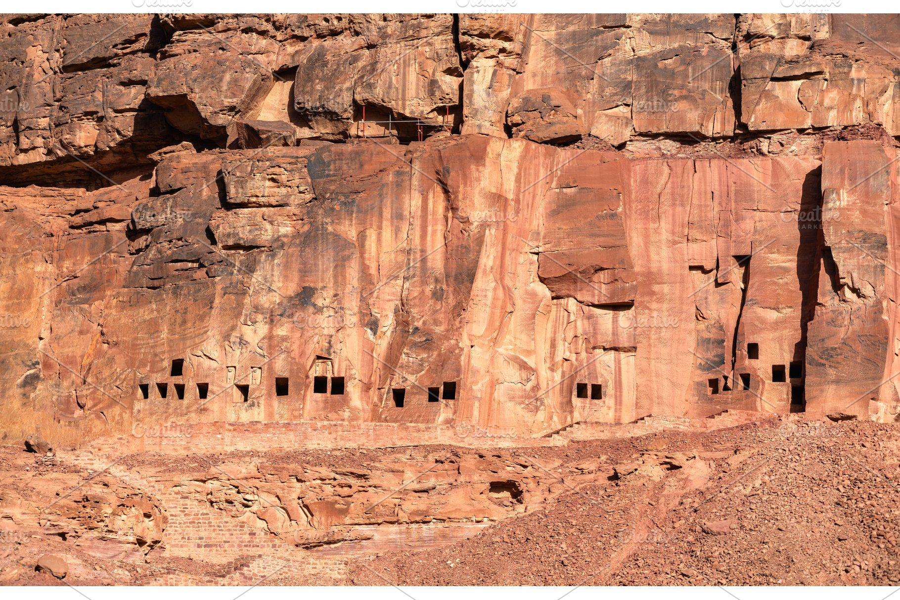 Ancient rock cut tombs at Dadan archaeological site in AlUla, an Architecture Photo by Leonid Andronov