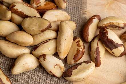 High-quality Brazil nuts peeled from the shell on the table, a Photo by MyPhotos
