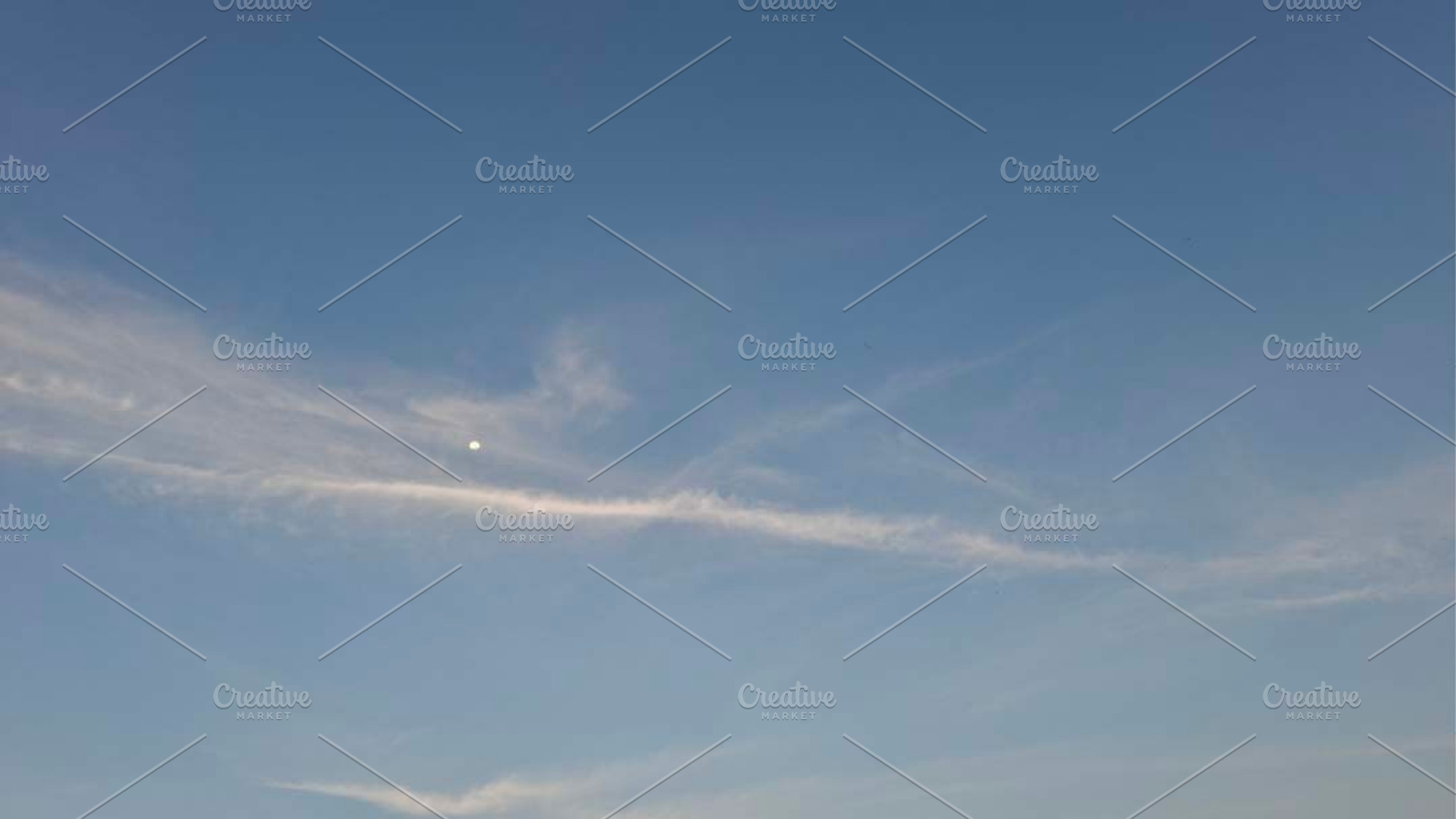 Photo of cirrus clouds with the moon, a Background Photo by Pray Art Design Studio