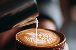 Barista making latte art, a Food & Drink Photo by MistyDay